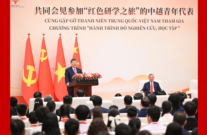 习近平同苏林共同会见中越青年代表