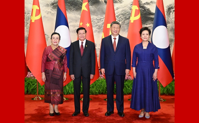 习近平同老挝人革党中央总书记、国家主席通伦会谈