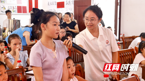 湖南农业大学水利与土木工程学院水韵工翼“三下乡”实践团在龙虎水库灌区进行科普宣讲。.jpg 湖南农业大学水利与土木工程学院水韵工翼“三下乡”实践团在龙虎水库灌区进行科普宣讲。.jpg